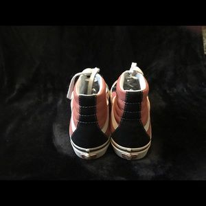 Vans. High top shoes